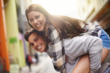 Happiness, hug and portrait of couple piggyback ride for fun urban adventure, bonding and city...
