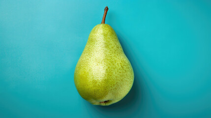 Blue hues background single pear fruit