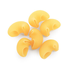 Raw horns pasta isolated on white, top view