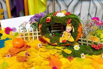 Fototapeta premium The doll house is made of pumpkin and natural materials