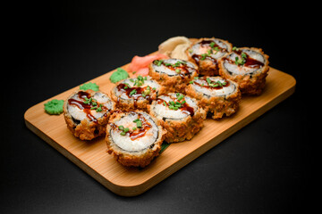 Delightful breaded sushi set with green onions and soy sauce infusion