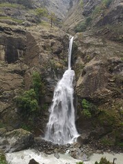 A majestic waterfall cascades down rocks