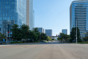 Car background, empty roads and skyscrapers in the financial district, Xiamen, China