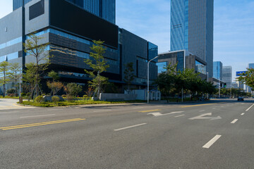 Car background, empty roads and skyscrapers in the financial district, Xiamen, China