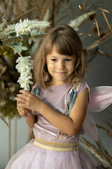 little elf girl in flowers