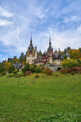 Peles Castle in Romania on a cloudy autumn day