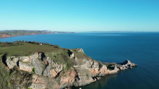 Babbacombe, Torbay, South Devon, England: DRONE VIEWS: Anstey's Cove, a former limestone quarry and Walls Hill. The Cove is associated with smugglers and the crime writer, Agatha Christie (Clip 3).