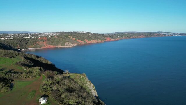 Babbacombe, Torbay, South Devon, England: DRONE VIEWS: Anstey's Cove and Walls Hill park (former Iron Age fort). The Cove is associated with smuggling and the crime writer, Agatha Christie (Clip 7).