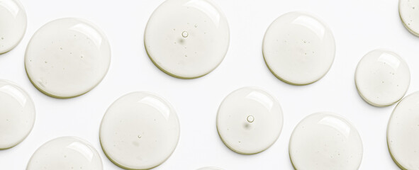 Drops of moisturizing gel or serum on a white background. Cosmetic product for skin care