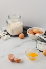 Ingredients for Homemade Pasta on White Marble Counter Top
