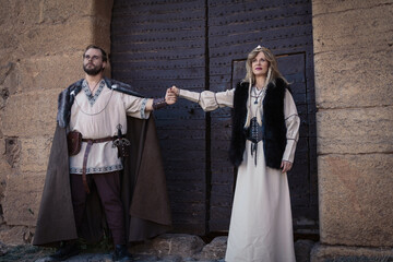 Chivalrous Medieval Knight and Lady at Castle Doorway