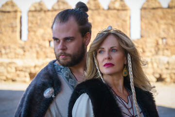 Medieval Man and Woman in Costume at Castle Grounds