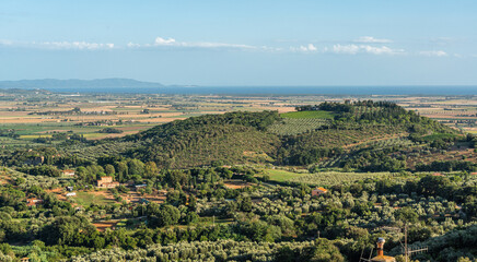 Amazing panorama from village of Campiglia Marittima, on a sunny summer afternoon. In the Province of Livorno, in the Tuscany region of Italy. © e55evu
