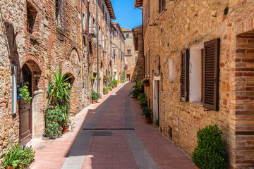 Fototapeta na wymiar The picturesque village of Casole d'Elsa on a sunny summer morning. Province of Siena, Tuscany, Italy