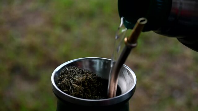 Serve mate with a thermos. Traditional infusion of yerba mate consumed in Argentina, Brazil, Paraguay and Uruguay.