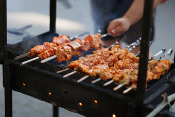 Bar-B-Q or BBQ with kebab cooking. Charcoal grill of  meat skewers.