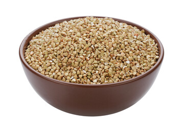 Unroasted buckwheat in a bowl. Isolated on a white background.