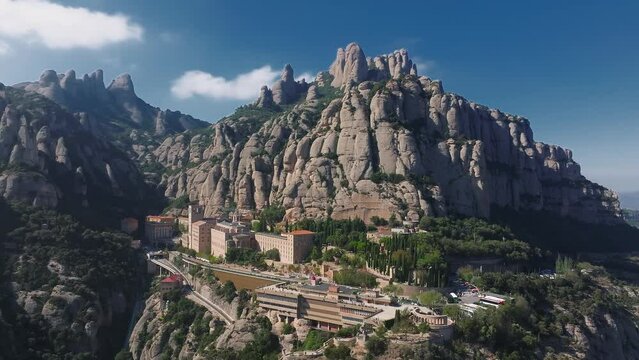 Aerial view of the Benedict church Abbey of Monserrat from Barcelona, Spain. Montserrat Monastery, Santa Maria de Montserrat is a Benedictine abbey located on the mountain of Montserrat