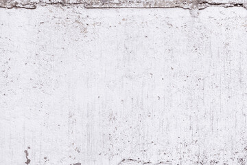 Old white wall background. White concrete wall texture with scratches and dust. Abstract white wallpaper.