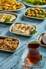 Fototapeta na wymiar Traditional Turkish breakfast with the cup of tea