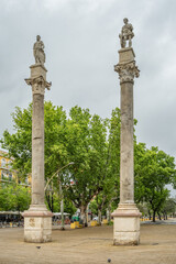 Fototapeta na wymiar Roman columns at Alameda de Hercules in Seville, Spain