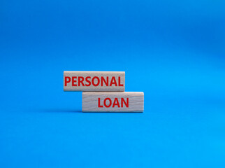 Personal Loan symbol. Concept word Personal Loan on wooden blocks. Beautiful blue background. Business and Personal Loan concept. Copy space