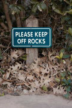 Please Keep Off Rocks Sign