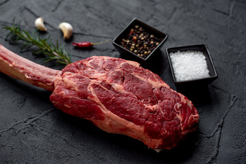 raw Steak 
Tomahawk on stone background 