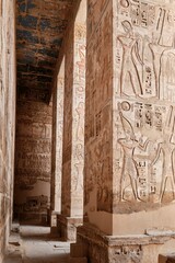 Luxor, Egypt - December 26 2023: Mortuary Temple of Ramesses III in Medinat Habu Complex