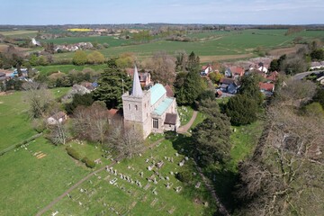 Anne of Cleves, St Mary  church Great Bardfield village in Essex UK drone aerial view