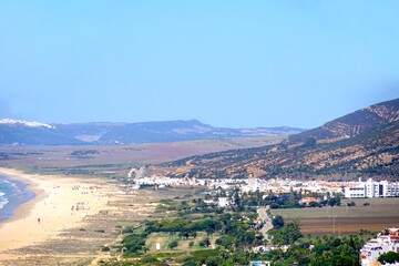 Fototapeta premium view from the mountains along the beach Playa del Cabo de la Plata towards Zahara de los Atunes, Costa de la Luz, Andalusia, Spain