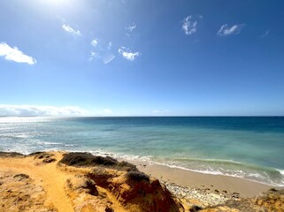 orange colored coast between Tarifa and Valdevaqueros with a view towards the Atlantic Ocean, Costa...
