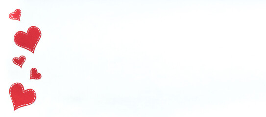 Red paper hearts isolated on white background. Valentine's Day. Copy space. Top view. Banner