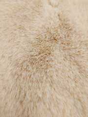 Bedding, carpet with a fluffy fur plaid. Copy space. Flat lay, top view.
