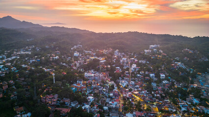 Sayulita Mexico town in riviera Nayarit travel destination for surf real estate land for sale aerial at sunset  - obrazy, fototapety, plakaty