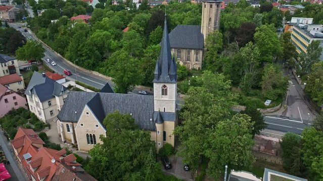 Aerial drone view of Kath. Pfarrei St. Johannes Baptist Jena in Thuringia, Germany . 