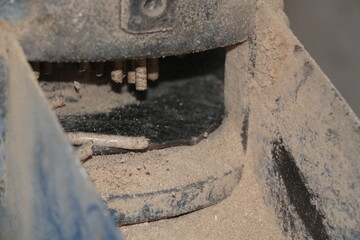 Pellets fly out of the machine. Pellet production. Production stage of pellet fuel