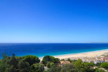 Fototapeta na wymiar view from the moutains over the beautiful sandy beach at Atlanterra, Playa de Atlanterra, Zahara de los Atunes, Costa de la Luz, Andalusia, Spain