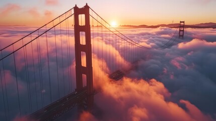 Breathtaking aerial of cinematic Golden Gate at sunset. Cars driving by red bridge covered in scenic clouds. Karl the Fog drifting below red bridge main landmark of San Francisco California USA 4K    