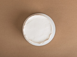 Simple bento cake mockup, top view on cream surface