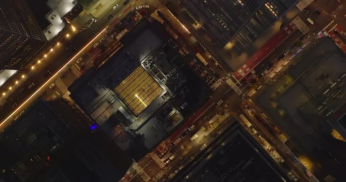 Stunning aerial night drone shot of New York's downtown district. Helicopter night Manhattan. New York City at night. Birds Eye cinematic Metropolitan 5k Aerial.
Modern cityscape skyscrapers skyline. 