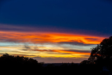 Fototapeta na wymiar Idyllic multicolored sky at dawn in a panoramic setting