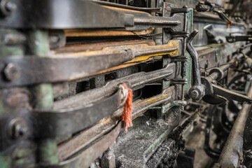 Detail of a historic loom machine.