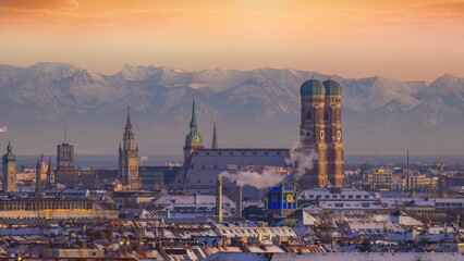 Munich cityscape aerial view at sunset, munich frauenkirche germany city alps mountains.