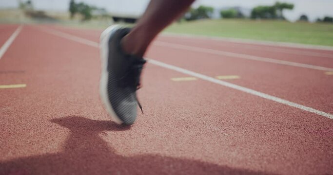 Person, laces and tie shoes for running, exercise or outdoor workout on stadium track. Closeup of athlete or runner tying shoe and getting ready for race, sprint or competition in challenge or start