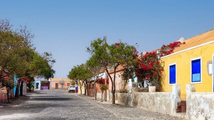 Sal Rei rainbow facades : the painted streets of tropical town. Boa Vista, Cape Verde.