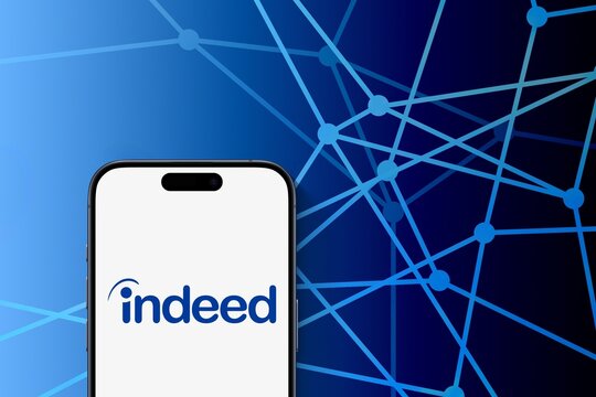 indeed logo is displayed on a modern smartphone, blue connected dots background, business contacts, job search, job offer, career, business
