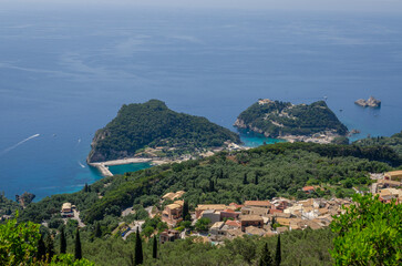 Beautiful aerial view of Palaiokastritsa boats and beach Corfu Greece
