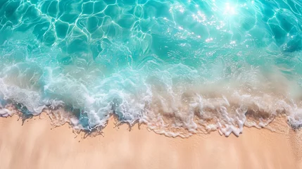Foto op Canvas Abstract sand beach from above with light blue transparent water wave and sun lights, summer vacation background concept banner with copy space, natural beauty spa outdoors © Orxan