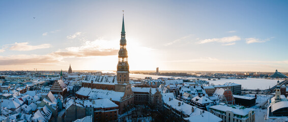 Aerial panorama view of Riga old town during beautiful winter day in Latvia. Freezing temperature...